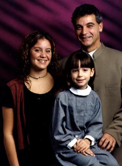 Alain Massicotte with his daughters, Melissa and Jade