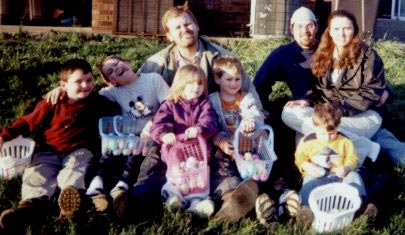 Travis McCuddy, April, close friend Chris Campbell  and children